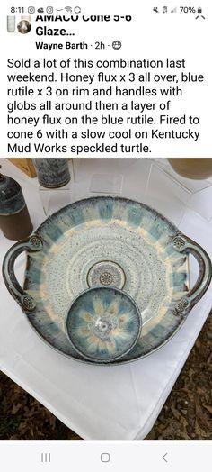 a glass bowl sitting on top of a table