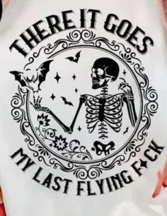 there it goes i'm just flying over skeleton on white bib with black lettering