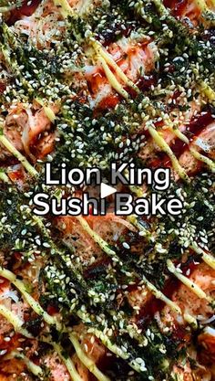 a close up of a pizza with sesame seeds on it and the words lion king sushi bake