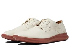 Johnston & Murphy Hennings Plain Toe - Men's Shoes : Sand : Stay classy without losing comfort wearing the Johnston Murphy Hennings Plain Toe Shoes. Leather upper. Leather lining and insole. Brogue-style detailing. Foam cushioned footbed. Lace-up closure and classic round toe silhouette. Synthetic outsole. Imported. Measurements: Weight: 10 oz Product measurements were taken using size 9, width M. Please note that measurements may vary by size. Weight of footwear is based on a single item, not a Business Casual Oxfords With Removable Insole And Round Toe, Classic Business Casual Sneakers With Ortholite Insole, Classic Leather Sneakers With Arch Support, Business Casual Sneakers With Cushioned Footbed And Round Toe, Classic Medium Width Round Toe Oxfords, Classic Oxfords With Round Toe And Medium Width, Classic Oxford Shoes With Round Toe, Classic Synthetic Oxfords With Cushioned Footbed, Elegant Wingtip Sneakers With Removable Insole