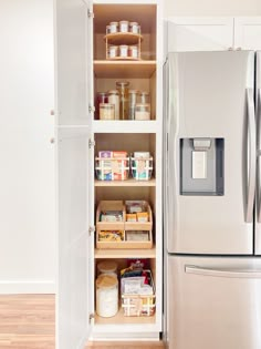 an organized pantry in the corner of a kitchen