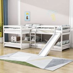 a child's bedroom with bunk beds and slide