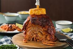 there is a large piece of meat on the cutting board