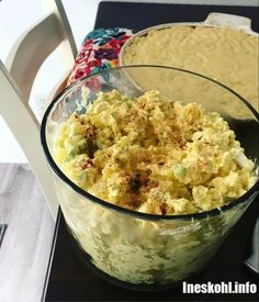 a glass bowl filled with macaroni and cheese