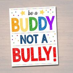 a card with the words be a buddy not a bully on it, and stars