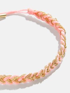 Get the best of both worlds with the Hannah Bracelet — a cord and chain bracelet that’s braided together for a look that rocks. Available in the color of your choice, so you can choose the hue that suits your mood. Adjustable Pink Braided Friendship Bracelets, Pink Adjustable Chain Bracelet For Party, Adjustable Pink Chain Bracelet For Party, Trendy Resizable Jewelry With Nylon Cord, Trendy Gold Braided Bracelet With Sliding Knot, Trendy Gold Braided Friendship Bracelet, Trendy Pink Jewelry With Adjustable Cord, Trendy Pink Braided Bracelet With Adjustable Cord, Friendship Braided Bracelet In Nylon Cord