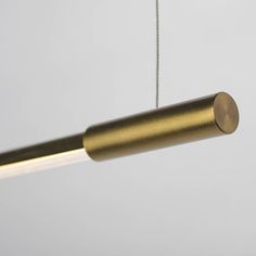 a close up of a light fixture on a white wall with no one in it