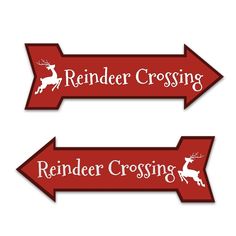 two red arrow signs with reindeer crossing and reindeer crossing on each one, both pointing in opposite directions