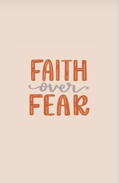 the words faith over fear written in orange and gray ink on a light pink background