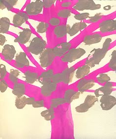 a pink tree with lots of leaves on it's trunk and branches are arranged in the shape of circles