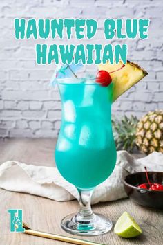 a blue hawaiian cocktail with pineapple and cherries