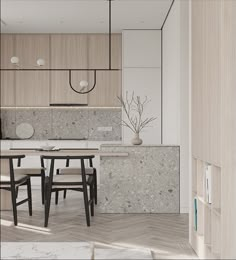 an open kitchen and dining area with marble countertops, wood cabinets, and chairs