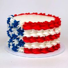 an american flag cake with red, white and blue icing