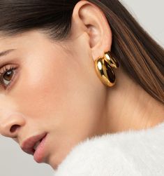 These are lightweight and waterproof! We love these modern hoop earrings for the size and chicness. Style these earrings up for a fun night out or make them an essential part of your daily line up. Luxury Modern Teardrop Hoop Earrings, Trendy Huggie Earrings For Party, Chic Small Hoop Earrings For Party, Modern Twist Earrings For Everyday Wear, Modern Small Hoop Earrings For Party, Chic Small Hoop Earrings, Trendy Small Hoop Wrap Earring, Trendy Single Small Hoop Wrap Earring, Chic Hoop Wrap Earrings For Everyday