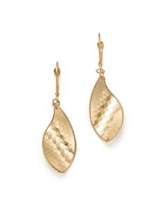 Geometric cuts catch the light on these uniquely curved leaf drop earrings, cast in 14K yellow gold. Only at Bloomingdale's. Jewelry Texture, Geometric Leaf, Fw 2022, Huggie Earrings Gold, Floral Cocktails, Sweet Accessories, Pearl Jewels, Disney 100, Organic Jewelry