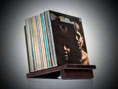 a stack of records sitting on top of each other