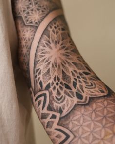 a person with a tattoo on their arm