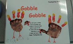 there is a sign with two hand prints on it that says gobble gobble