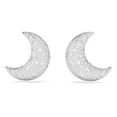 Moongazing inspiration meets dazzling style in these clip earrings from the Sublima family. The rhodium plated design features an elegant pair of crescent moons, each embellished in five different sizes of crystals for a refined pavé effect. Clip on and step out for an evening under the stars. Elegant Crescent Diamond Earrings, Elegant Half Moon Earrings With Moon Charm, Elegant Moon Phase Earrings, Elegant Moon Shaped Cubic Zirconia Earrings, Elegant Silver Moon-shaped Earrings, Elegant Moon-shaped Silver Earrings, Elegant White Moon Phase Earrings, Swarovski Objects, Swarovski Swan