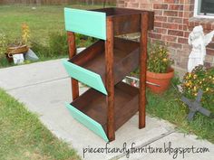 a wooden shelf sitting on top of a sidewalk