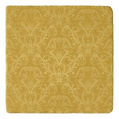 an ornate yellow background with swirls and scrolls