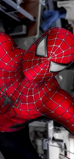 the amazing spider - man is in his web suit