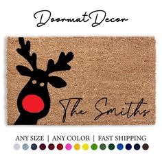 a door mat with a reindeer's head on it and the word, the santa