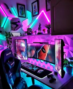 a computer desk with two monitors and a keyboard on top of it in front of purple lighting