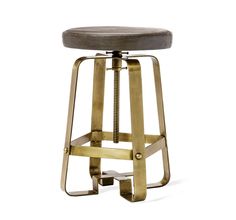 the stool is made from metal and has a leather seat