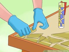 How to Make a Mosaic Table Top: 15 Steps (with Pictures) - wikiHow Diy Glass Table Base, Mosaic Coffee Table Diy, Camper Tables, Door Table Top, Mosaic Table Top Designs, Table Top Diy, Mosaic Faces, Mosaic Outdoor Table, Mosaic Patio Table