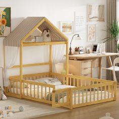 a child's bed with a wooden frame and canopy over it in a white room