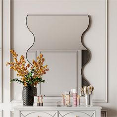 a white dresser topped with a vase filled with flowers and candles next to a mirror