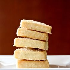 a stack of shortbreads sitting on top of a white plate