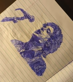 a piece of paper with a drawing of a man on it