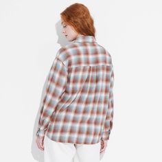 Flannel button-down shirt from Wild Fable™ with a plaid pattern. Made from lightweight cotton. Designed in an oversized fit with a collared neckline, full front button-down closure, chest patch pocket and long sleeves with buttoned cuffs. Tunic-length shirttail hem completes the stylish look. If you're not satisfied with any Target Owned Brand item, return it within one year with a receipt for an exchange or a refund. Wild Fable™: A look for every story. Oversized Flannel Shirt For Fall, Relaxed Fit Plaid Flannel Shacket, Relaxed Fit Collared Flannel Shirt, Casual Cotton Flannel Shirt For Daywear, Oversized Plaid Tops For Everyday, Classic Oversized Button-up Flannel Shirt, Plaid Shacket With Button Closure And Relaxed Fit, Plaid Relaxed Fit Shirt For Fall, Relaxed Fit Plaid Shirt For Fall