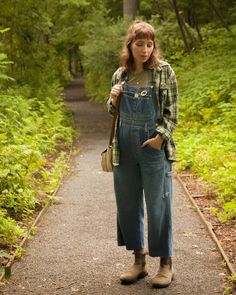 Farmer Overalls Outfit, Flannel And Overalls, Flannel Over Overalls, Overall Flannel Outfit, Outfits With Green Overalls, Rainy Day Overalls Outfit, Jacket And Overalls, Overall With Flannel Outfit, Witchy Overalls Outfit