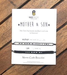 the mother and son bracelet is shown on top of a piece of paper that says, more code bracelet