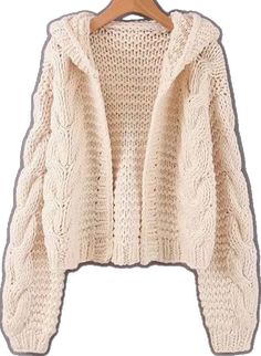 a white knitted sweater hanging on a wooden hanger, with the hood pulled up