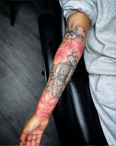 a person with a tattoo on their arm