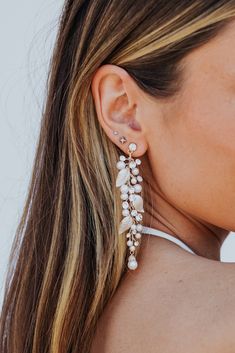 A pair of feminine statement drop earrings with pearl accents. Untamed Petals, Bridal Consultant, Swag Bag, Long Drop Earrings, Tie The Knot, Statement Drop Earrings, Wedding Show, Hawaii Wedding, Bridal Boutique