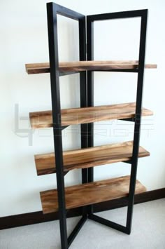 a book shelf made out of wood and black metal frame, with three shelves on each side