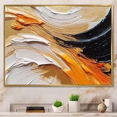 an abstract painting on the wall in a living room with white and gold accents,