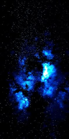 the night sky is filled with bright blue stars