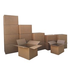 several cardboard boxes stacked on top of each other with one open box in the middle