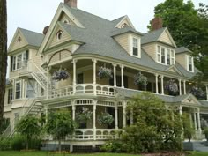 a large house with many windows and balconies