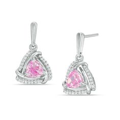 Bring on the bling with these sparkling fashion drop earrings. Crafted in sterling silver, each dainty dangle earring features a 5.0mm trillion-cut lab-created bright pink sapphire wrapped in a swirling triangular frame of polished and diamond-lined ribbons. Radiant with 1/6 ct. t.w. of diamonds and a brilliant buffed luster, these linear post earrings secure comfortably with friction backs. Pink Sterling Silver Earrings With Diamond Accents, Pink Diamond Earrings In Sterling Silver, Fine Jewelry Diamond Birthstone Earrings, Trillion Cut Earrings, Peoples Jewellers, Sapphire Stone, Yellow Diamond, Diamond Stone, Stone Earrings