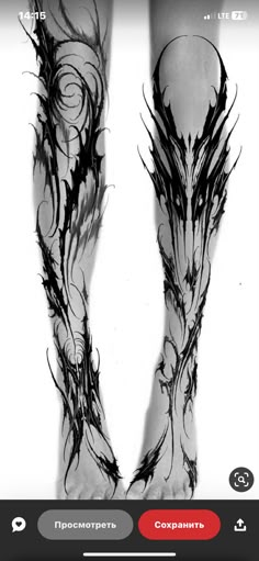 an image of a pair of legs with tattoos on them