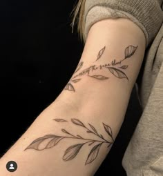 a woman with a tattoo on her arm that says, you're not there