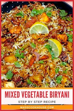 mixed vegetable biriyani recipe in a skillet with lemons and cilantro