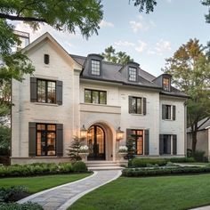 a large white house with lots of windows